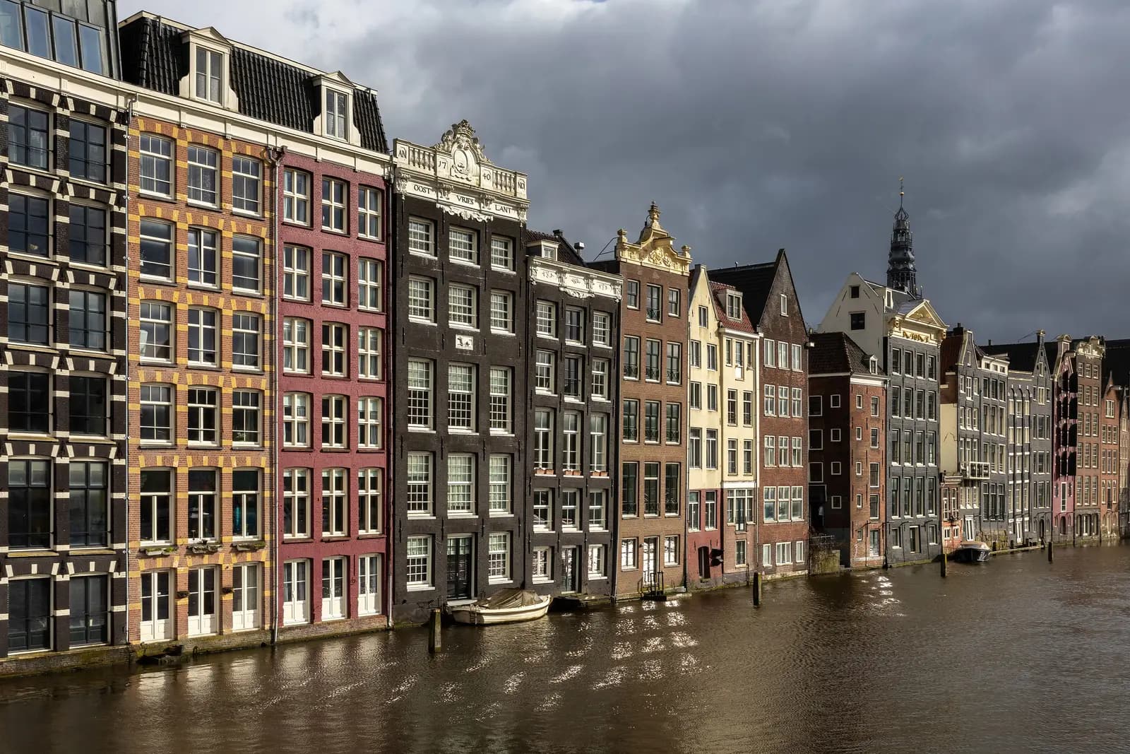 Canal houses on the Damrak at golden hour, Amsterdam