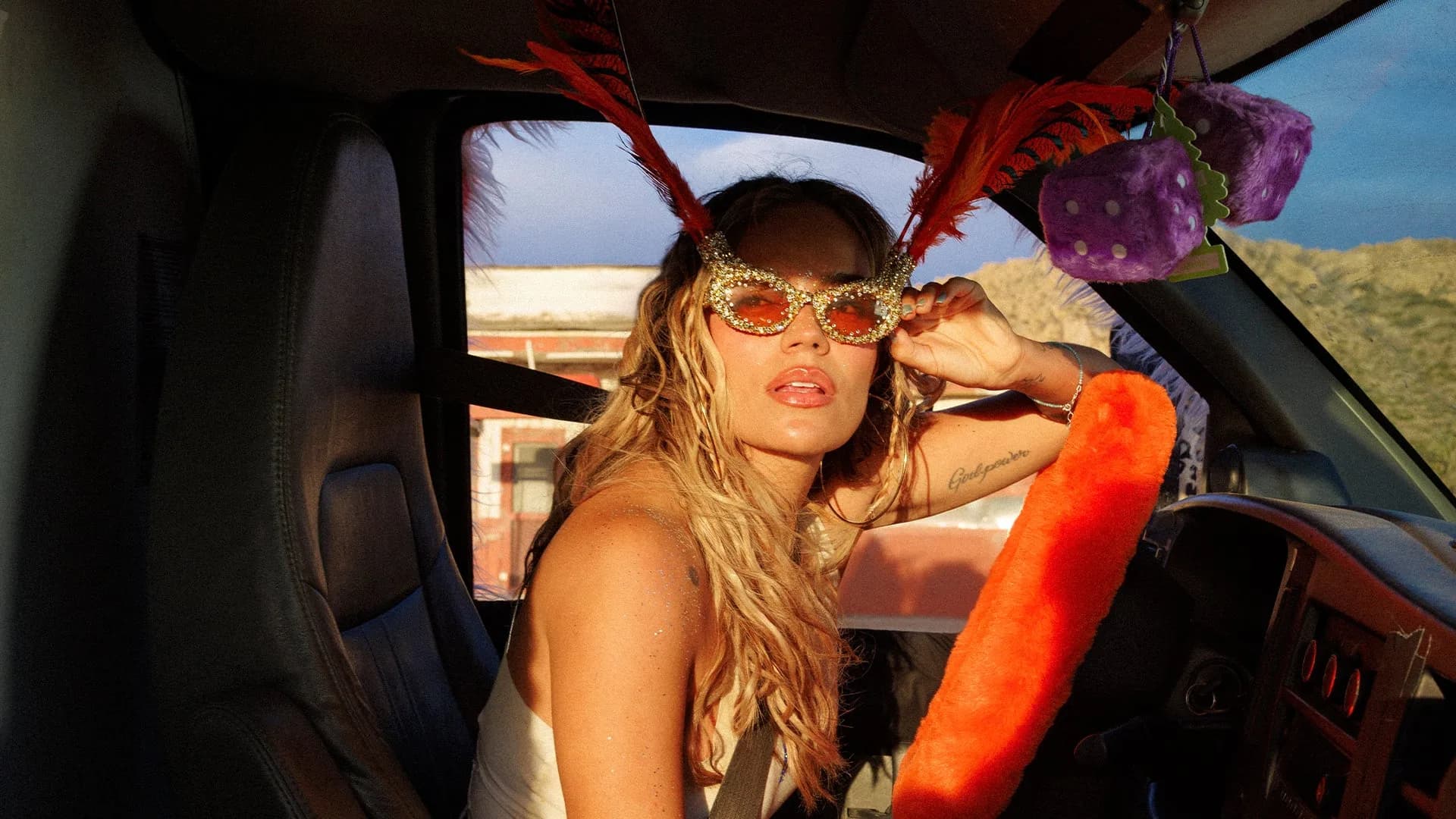 Karol G — Viajando por el Mundo Tropitour promotional photo